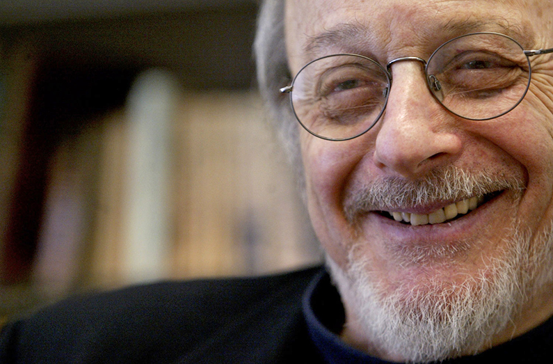 In this April 27, 2004 file photo, author E.L. Doctorow smiles during an interview in his office at New York University. (AP Photo/Mary Altaffer, file)